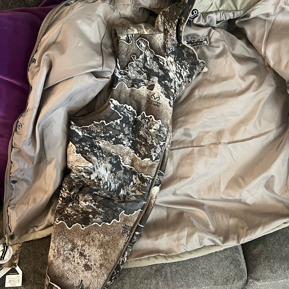 Brand new with tags, men’s coat sized large